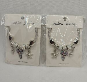 Silver Charm Bracelet with Starfish and Shell Accents